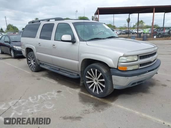 2004 Chevrolet Suburban LS z VIN 3GNFK16Z04G134581, wystawiony jako IAAI lot #41928119 z przebiegiem 300 725 mil mil oraz . Historia ofert i sprzedaży dostępna na DreamBid. Obrazek 1.