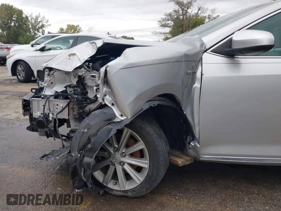 2013 Toyota Camry LE z VIN 4T1BD1FK2DU069763, wystawiony jako IAAI lot #43414989 z przebiegiem 70 738 mil mil oraz . Historia ofert i sprzedaży dostępna na DreamBid. Obrazek 6.