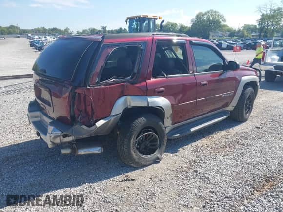 2004 Chevrolet TrailBlazer LT with VIN 1GNDT13S842255041, listed as a IAAI auction lot 43291819 with Not provided miles and . Bid and sale history available at DreamBid. Image 4.