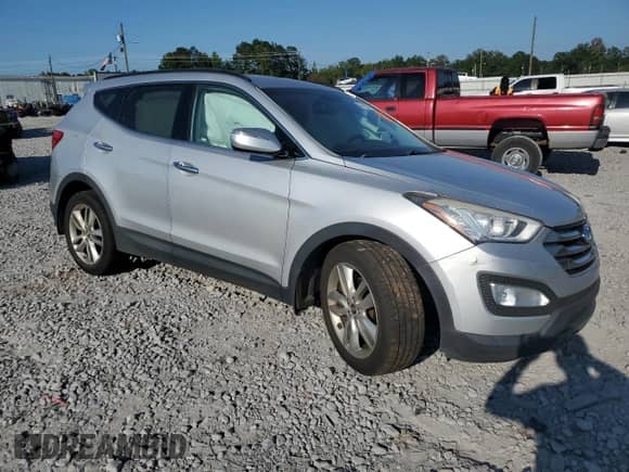 2014 Hyundai Santa Fe with VIN 5XYZU3LA2EG206424, listed as a Copart auction lot 80142385 with 194,183 mi miles and Salvage title. Bid and sale history available at DreamBid. Image 4.