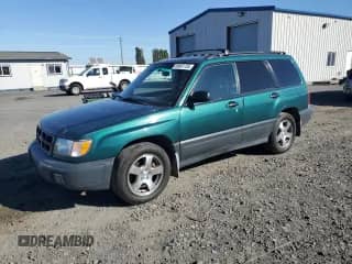 1999 Subaru Forester L z VIN JF1SF6353XH727569, wystawiony jako Copart lot #85581735 z przebiegiem 134 026 mil mil oraz Szkoda całkowita • Salvage title. Historia ofert i sprzedaży dostępna na DreamBid. Obrazek 1.