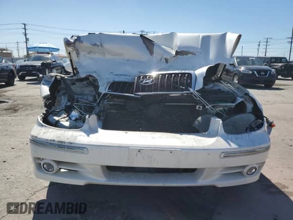 2004 Hyundai Sonata GLS z VIN KMHWF35H54A029224, wystawiony jako Copart lot #71306425 z przebiegiem 107 260 mil mil oraz Szkoda całkowita • Salvage title. Historia ofert i sprzedaży dostępna na DreamBid. Obrazek 5.