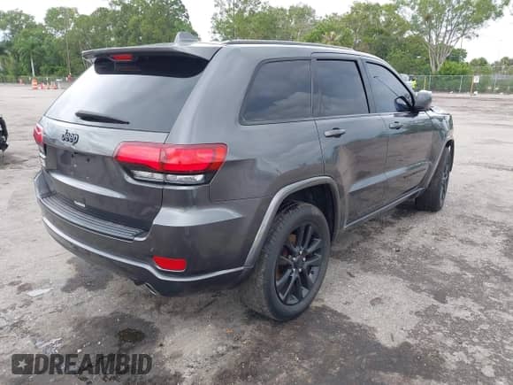 2018 Jeep Grand Cherokee Altitude z VIN 1C4RJEAG2JC428214, wystawiony jako IAAI lot #43081600 z przebiegiem 81 859 mil mil oraz . Historia ofert i sprzedaży dostępna na DreamBid. Obrazek 4.