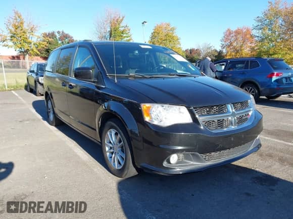 2020 Dodge Grand Caravan SXT with VIN 2C4RDGCG6LR153148, listed as a IAAI auction lot 43453578 with 90,915 mi miles and . Bid and sale history available at DreamBid. Image 1.
