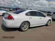 2011 Chevrolet Impala LTZ z VIN 2G1WC5EM2B1139234, wystawiony jako Copart lot #64429365 z przebiegiem 118 343 mil mil oraz Czysty tytuł • Clean title. Historia ofert i sprzedaży dostępna na DreamBid. Obrazek 3.