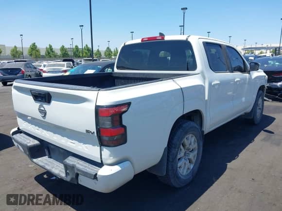 2022 Nissan Frontier S with VIN 1N6ED1EJ9NN660143, listed as a IAAI auction lot 42789371 with 103,729 mi miles and . Bid and sale history available at DreamBid. Image 4.