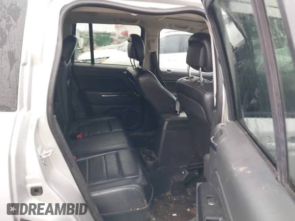 2012 Jeep Compass Limited z VIN 1C4NJCCB3CD511555, wystawiony jako IAAI lot #41752339 z przebiegiem 128 435 mil mil oraz . Historia ofert i sprzedaży dostępna na DreamBid. Obrazek 8.