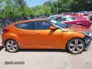 2013 Hyundai Veloster w/Black Int z VIN KMHTC6AD8DU175373, wystawiony jako IAAI lot #42567057 z przebiegiem 141 693 mil mil oraz . Historia ofert i sprzedaży dostępna na DreamBid. Obrazek 14.