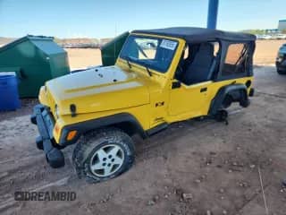 2003 Jeep Wrangler X z VIN 1J4FA39S23P370501, wystawiony jako Copart lot #81160855 z przebiegiem 155 930 mil mil oraz Szkoda całkowita • Salvage title. Historia ofert i sprzedaży dostępna na DreamBid. Obrazek 1.