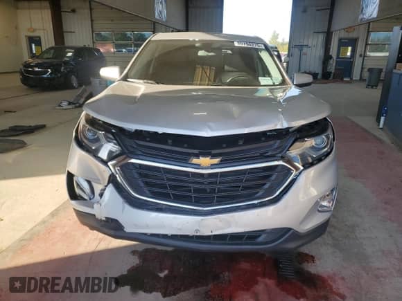 2018 Chevrolet Equinox LT с VIN 2GNAXSEV6J6193674, выставлен на аукционе Copart как лот 80790275 с пробегом 77 505 миль миль и Списание • Salvage title. История ставок и продаж доступна на DreamBid. Изображение 5.
