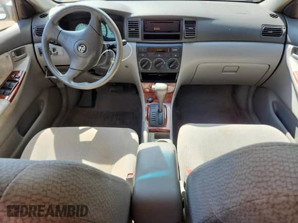 2003 Toyota Corolla CE with VIN JTDBR32E332007218, listed as a Copart auction lot 70623305 with 98,886 mi miles and Salvage title. Bid and sale history available at DreamBid. Image 8.