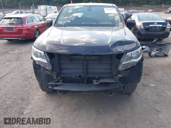 2018 Chevrolet Colorado 4WD LT z VIN 1GCHTCEN1J1127819, wystawiony jako IAAI lot #42745833 z przebiegiem 141 946 mil mil oraz . Historia ofert i sprzedaży dostępna na DreamBid. Obrazek 6.