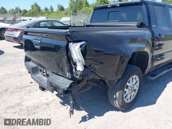 2024 Toyota Tacoma SR5 with VIN 3TMLB5JN4RM068147, listed as a IAAI auction lot 43177753 with 15,469 mi miles and . Bid and sale history available at DreamBid. Image 6.