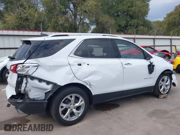2018 Chevrolet Equinox LT with VIN 2GNAXKEX5J6158772, listed as a IAAI auction lot 43394872 with 102,480 mi miles and . Bid and sale history available at DreamBid. Image 15.