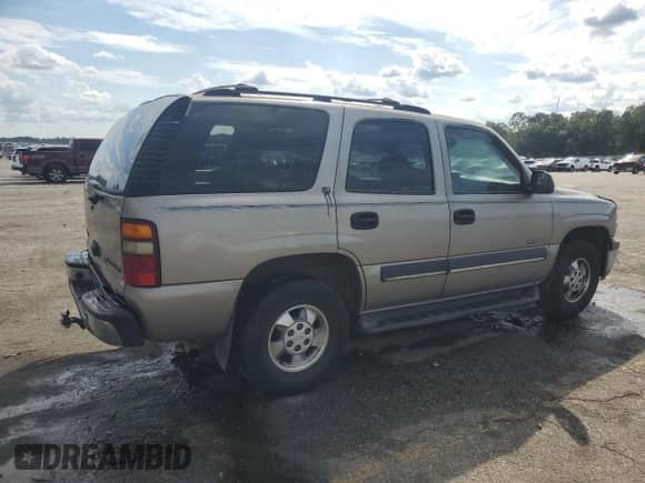 2002 Chevrolet Tahoe LT with VIN 1GNEC13Z02J101895, listed as a Copart auction lot 85274875 with 280,761 mi miles and Salvage title. Bid and sale history available at DreamBid. Image 3.