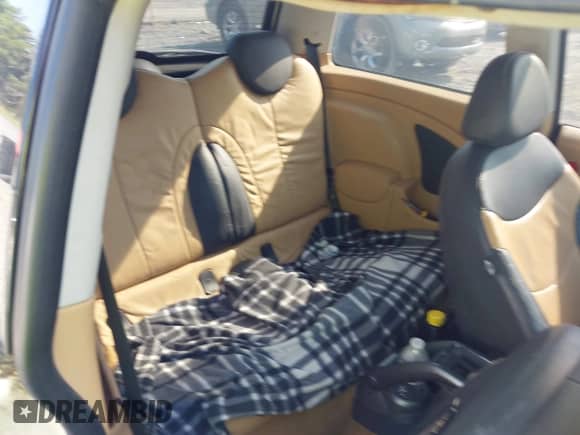 2006 MINI Hardtop with VIN WMWRC33506TK18077, listed as a IAAI auction lot 42583190 with 170,819 mi miles and . Bid and sale history available at DreamBid. Image 8.