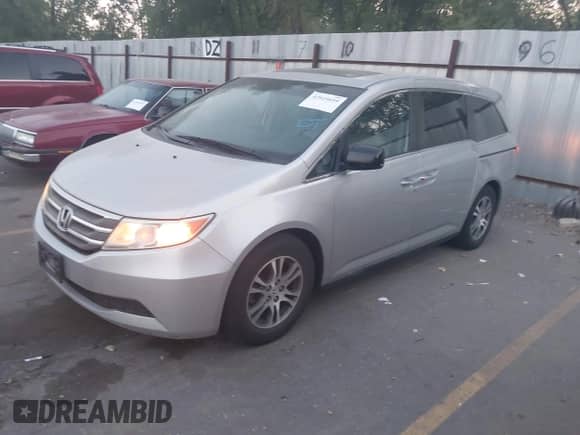 2013 Honda Odyssey EX-L с VIN 5FNRL5H67DB002193, выставлен на аукционе IAAI как лот 42929695 с пробегом 214 058 миль миль и . История ставок и продаж доступна на DreamBid. Изображение 2.