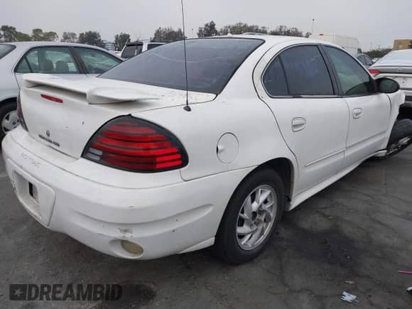 2004 Pontiac Grand Am SE1 with VIN 1G2NF52E14M552216, listed as a IAAI auction lot 43012968 with 210,777 mi miles and . Bid and sale history available at DreamBid. Image 4.