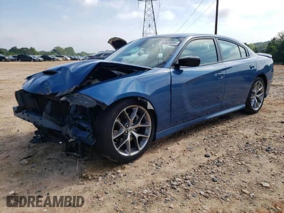 2023 Dodge Charger GT with VIN 2C3CDXHG5PH626441, listed as a Copart auction lot 66803005 with 56,311 mi miles and Salvage title. Bid and sale history available at DreamBid. Image 1.