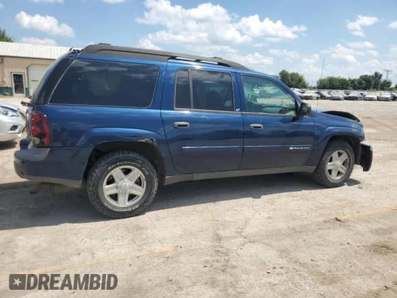 2003 Chevrolet TrailBlazer EXT LT z VIN 1GNET16S936187498, wystawiony jako Copart lot #69054275 z przebiegiem 188 046 mil mil oraz Szkoda całkowita • Salvage title. Historia ofert i sprzedaży dostępna na DreamBid. Obrazek 3.