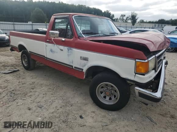 1990 Ford F-150 with VIN 1FTEF15N9LNA45119, listed as a Copart auction lot 84592895 with 30,821 mi miles and Salvage title. Bid and sale history available at DreamBid. Image 4.