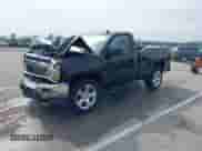2014 Chevrolet Silverado 1500 LT with VIN 1GCNKREH4EZ348664, listed as a IAAI auction lot 42513995 with 212,233 mi miles and . Bid and sale history available at DreamBid. Image 2.