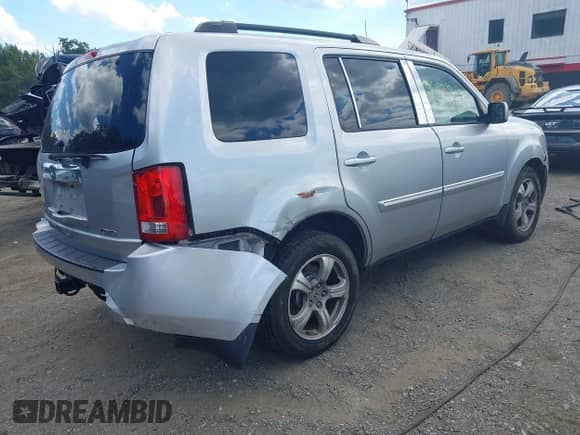 2014 Honda Pilot EX-L with VIN 5FNYF4H53EB001242, listed as a IAAI auction lot 43091314 with 175,745 mi miles and . Bid and sale history available at DreamBid. Image 4.