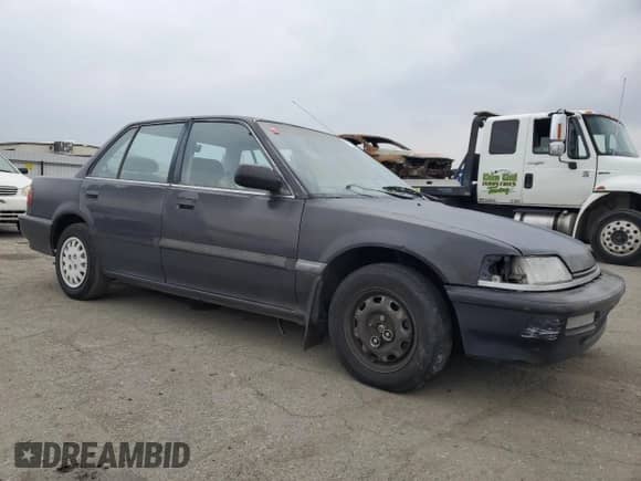1991 Honda Civic z VIN 1HGED3658ML072049, wystawiony jako Copart lot #87925505 z przebiegiem 292 209 mil mil oraz Czysty tytuł • Clean title. Historia ofert i sprzedaży dostępna na DreamBid. Obrazek 4.