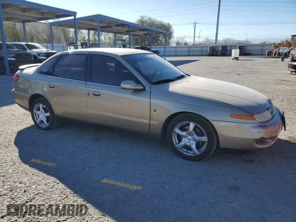 2001 Saturn LS with VIN 1G8JU52F81Y557470, listed as a Copart auction lot 42149445 with 139,215 mi miles and Salvage title. Bid and sale history available at DreamBid. Image 4.