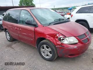 2005 Dodge Caravan SXT with VIN 1D4GP45R05B104057, listed as a IAAI auction lot 42330306 with 185,469 mi miles and . Bid and sale history available at DreamBid. Image 1.