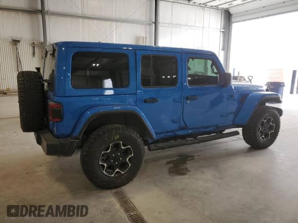 2022 Jeep Wrangler Unlimited Rubicon с VIN 1C4JJXR67NW257792, выставлен на аукционе Copart как лот 57178745 с пробегом 25 067 миль миль и Списание • Salvage title. История ставок и продаж доступна на DreamBid. Изображение 3.