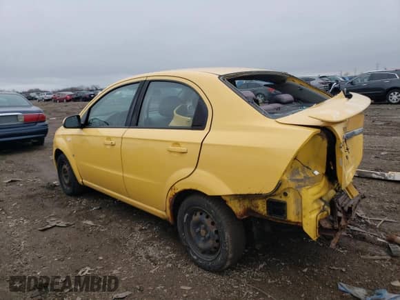 2008 Chevrolet Aveo LS z VIN KL1TD56628B124806, wystawiony jako Copart lot #65715244 z przebiegiem Nie podano mil oraz Szkoda całkowita • Salvage title. Historia ofert i sprzedaży dostępna na DreamBid. Obrazek 2.