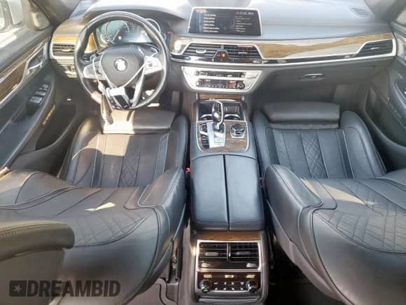 2017 BMW 7 Series 740i xDrive с VIN WBA7E4C58HGU99600, выставлен на аукционе Copart как лот 71171785 с пробегом 91 563 миль миль и Списание • Salvage title. История ставок и продаж доступна на DreamBid. Изображение 8.
