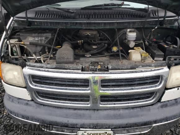 2000 Dodge Passenger with VIN 2B5WB35ZXYK166395, listed as a Copart auction lot 83293364 with 116,511 mi miles and Salvage title. Bid and sale history available at DreamBid. Image 12.