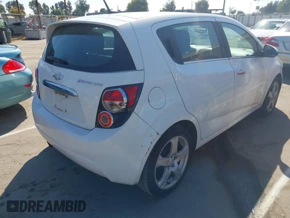 2013 Chevrolet Sonic LTZ with VIN 1G1JE6SH1D4196761, listed as a IAAI auction lot 42746967 with 158,863 mi miles and . Bid and sale history available at DreamBid. Image 4.