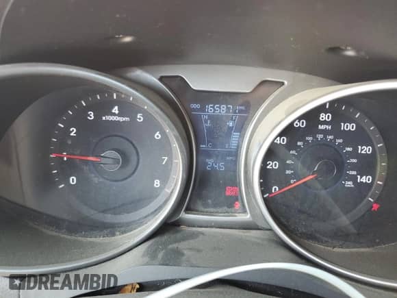 2013 Hyundai Veloster w/Black Int с VIN KMHTC6AD9DU094754, выставлен на аукционе Copart как лот 64644975 с пробегом 165 871 миль миль и Списание • Salvage title. История ставок и продаж доступна на DreamBid. Изображение 9.