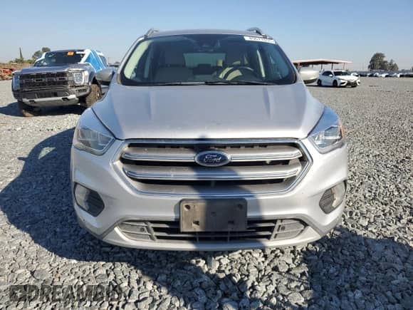 2017 Ford Escape Titanium z VIN 1FMCU0JD2HUE74535, wystawiony jako Copart lot #89677855 z przebiegiem 160 102 mil mil oraz Czysty tytuł • Clean title. Historia ofert i sprzedaży dostępna na DreamBid. Obrazek 5.