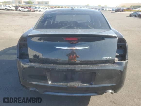 2014 Chrysler 300 SRT-8 с VIN 2C3CCAFJ1EH206137, выставлен на аукционе Copart как лот 64228645 с пробегом Не указан миль и На запчасти • Non repairable. История ставок и продаж доступна на DreamBid. Изображение 6.