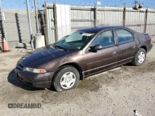 1997 Dodge Stratus с VIN 1B3EJ46X5VN540079, выставлен на аукционе Copart как лот 73252534 с пробегом Не указан миль и Чистый • Clean title. История ставок и продаж доступна на DreamBid. Изображение 1.