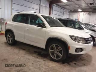 2017 Volkswagen Tiguan Sport with VIN WVGUV7AXXHK019674, listed as a IAAI auction lot 41374050 with 104,821 mi miles and . Bid and sale history available at DreamBid. Image 1.