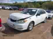 2002 Toyota Camry LE z VIN 4T1BE32K12U027581, wystawiony jako IAAI lot #40518698 z przebiegiem 187 076 mil mil oraz . Historia ofert i sprzedaży dostępna na DreamBid. Obrazek 2.