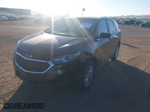 2021 Chevrolet Equinox LT z VIN 3GNAXKEV2ML401632, wystawiony jako IAAI lot #43182422 z przebiegiem 59 429 mil mil oraz . Historia ofert i sprzedaży dostępna na DreamBid. Obrazek 2.