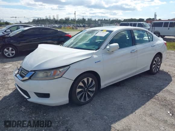 2015 Honda Accord Touring z VIN 1HGCR6F7XFA005639, wystawiony jako IAAI lot #38790828 z przebiegiem 182 865 mil mil oraz . Historia ofert i sprzedaży dostępna na DreamBid. Obrazek 17.