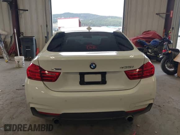 2015 BMW 4 Series 435i xDrive z VIN WBA4B3C53FD669771, wystawiony jako IAAI lot #41835401 z przebiegiem 145 570 mil mil oraz . Historia ofert i sprzedaży dostępna na DreamBid. Obrazek 16.