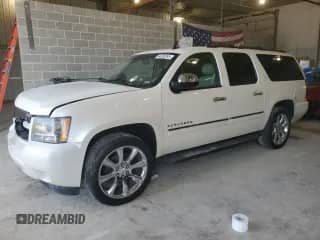 2013 Chevrolet Suburban LTZ с VIN 1GNSKKE74DR326106, выставлен на аукционе Copart как лот 64308265 с пробегом 166 423 миль миль и Списание • Salvage title. История ставок и продаж доступна на DreamBid. Изображение 1.