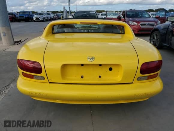 1995 Dodge Viper with VIN 1B3BR65E0SV201376, listed as a Copart auction lot 74423504 with Not provided miles and Salvage title. Bid and sale history available at DreamBid. Image 6.