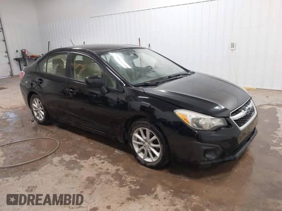 2014 Subaru Impreza Premium with VIN JF1GJAC61EH021004, listed as a IAAI auction lot 42919211 with 116,243 mi miles and . Bid and sale history available at DreamBid. Image 1.