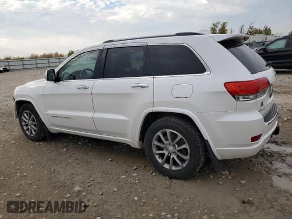 2016 Jeep Grand Cherokee Overland z VIN 1C4RJFCG7GC409038, wystawiony jako Copart lot #86667295 z przebiegiem 192 065 mil mil oraz Czysty tytuł • Clean title. Historia ofert i sprzedaży dostępna na DreamBid. Obrazek 2.