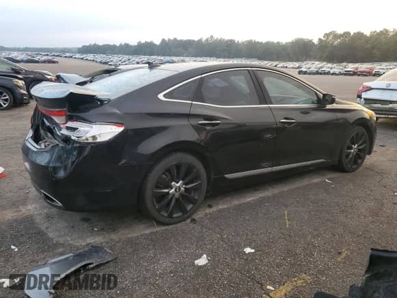 2013 Hyundai Azera с VIN KMHFH4JG8DA277190, выставлен на аукционе Copart как лот 79872954 с пробегом 222 832 миль миль и Списание • Salvage title. История ставок и продаж доступна на DreamBid. Изображение 3.