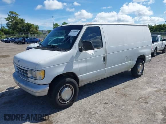 1996 Ford Econoline Cargo with VIN 1FTFE24Y9THB01647, listed as a IAAI auction lot 42990641 with 312,069 mi miles and . Bid and sale history available at DreamBid. Image 2.
